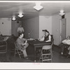 Men who work at the Navy shipyards in the community room at the FSA (Farm Security Administration) dormitories. Bremerton, Washington