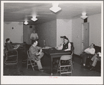 Men who work at the Navy shipyards in the community room at the FSA (Farm Security Administration) dormitories. Bremerton, Washington