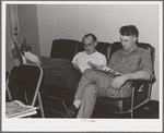 Workmen at the Navy shipyards in the community room at the FSA (Farm Security Administration) duration dormitories. Bremerton, Washington