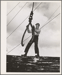 Lumberjack ready to sink the hook into a log. Long Bell Lumber Company, Cowlitz County, Washington