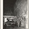 Dairy farmer unloading field beets in his barn. Tillamook County, Oregon