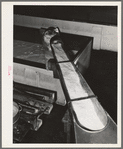 Milk pouring into vats where it will be processed into cheese. Tillamook cheese plant, Tillamook, Oregon