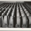 Tillamook cheese plant, Tillamook, Oregon. Cheese aging. Cheese made in Tillamook county had a value of 1,765,482 dollars in 1940