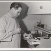 FSA (Farm Security Administration) dentist in the FSA dental trailer. Caldwell, Idaho