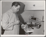 FSA (Farm Security Administration) dentist in the FSA dental trailer. Caldwell, Idaho