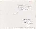 The FSA (Farm Security Administration) nurse types out dental record of migrant child in the dental trailer while at the FSA camp for farm workers. Caldwell, Idaho
