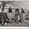 Wagon, huskers and gleaners at cornhusking contest. Ontario, Oregon