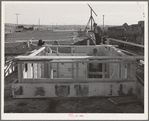 Black Canyon Project farmer builds house made possible by FSA (Farm Security Administration) special real estate loan. Canyon County, Idaho