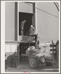 Checking in equipment from FSA (Farm Security Administration) mobile camps as it arrives at the FSA permanent camp at Caldwell, Idaho