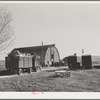 Equipment from the FSA (Farm Security Administration) mobile camps arrives at the permanent camp at Caldwell, Idaho