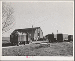 Equipment from the FSA (Farm Security Administration) mobile camps arrives at the permanent camp at Caldwell, Idaho