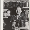 Mrs. Lee Wagoner with home canned fruits and vegetables. She and her husband farm on the Black Canyon Project. Canyon County, Idaho