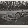 Salinas, California. Intercontinental Rubber Producers. Transplanting seedlings from the nursery into the field in a demonstration. This machine as well as all others used in cultivation of guayule was designed and built mostly from standard parts