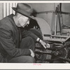 Salinas, California. Intercontinental Rubber Producers. D.O. Mumford, superintendent, in the company shops. He designed all mechanical equipment necessary in guayule cultivation