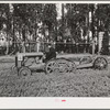 Salinas, California. Intercontinental Rubber Producers. A machine which digs guayule seedlings in the nursery. After the seedlings are dug, they must be separated by hand before transplanting