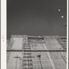 Looking up face of Shasta Dam, under construction. Shasta County, California