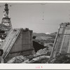 Shasta Dam under construction. Mount Shasta in background. Shasta County, California