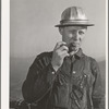 Workman at Shasta Dam. Shasta County, California