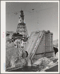 Shasta Dam under construction and cable tower. Shasta County, California
