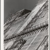 Construction work on face of Shasta Dam. Shasta County, California