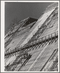 Construction work on face of Shasta Dam. Shasta County, California