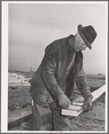 Mr. Palmer, who is building a house because he has a FSA (Farm Security Administration) real estate loan. Black Canyon Project, Canyon County, [Idaho]