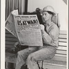 Workman at Shasta Dam reads war extra. Shasta County, California