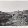 Shasta Dam, Shasta County, California. Looking down the river towards Shasta Dam under construction