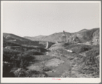 Shasta Dam, Shasta County, California. Looking down the river towards Shasta Dam under construction