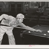 Workman at Shasta Dam plays pool. Shasta County, California