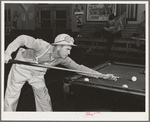 Workman at Shasta Dam plays pool. Shasta County, California