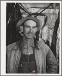 Sonoma County, California. Hired man on a chicken ranch