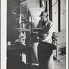 Petaluma, Sonoma County, California. Filling sacks with feed at a feed mill