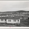 FSA (Farm Security Administration) defense housing dormitories at Vallejo, California, are in the background. Houses in foreground are defense housing of another agency