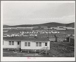 FSA (Farm Security Administration) defense housing dormitories at Vallejo, California, are in the background. Houses in foreground are defense housing of another agency