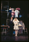 Steve Elmore, Beth Howland [center] and ensemble in the stage production Company