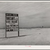 Pinal County, Arizona. Sign. The name "Dust Bowl" is reminiscent of home to the agricultural laborers of this section, many of whom came from the Dust Bowl sections of Texas and Oklahoma