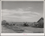 Farmyard, Imperial County, California. In Imperial County, comparatively few farm owners live on the farms, usually the houses seen on the farms are those of the foremen