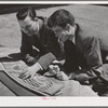 Vernon Demars, left, district landscape architecht for FSA (Farm Security Administration) and Garret Eckbo, district landscape architect for FSA work on site model of the Vallejo, California, defense housing dormitories