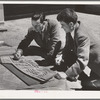 Vallejo, California. FSA (Farm Security Administration) defense housing project. Vernon DeMars, left, district architect and Garrett Eskbo district landscape architect for the FSA, work on the site model