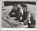 Vallejo, California. FSA (Farm Security Administration) defense housing project. Vernon DeMars, left, district architect and Garrett Eskbo district landscape architect for the FSA, work on the site model