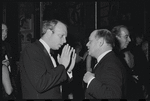 Harold Prince [left foreground], Vincente Minnelli [right background with cigarette in hand] and unidentified at opening night of the stage production Flora, the Red Menace