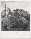 Grant County, Oregon. Malheur National Forest. Lumberjacks and truckload of logs