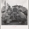 Grant County, Oregon. Malheur National Forest. Lumberjacks and truckload of logs