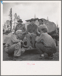 Grant County, Oregon. Malheur National Forest. Lumberjacks and truckload of logs