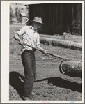 Ola, Idaho. FSA (Farm Security Administration) Ola self-help cooperative. A member uses a peavy to move a log