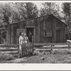 Ola, Idaho. FSA (Farm Security Administration) Ola self-help cooperative. Members visit a fellow member. This house had one room in 1939, it now has two rooms