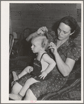 Ola, Idaho. FSA (Farm Security Administration) Ola self-help cooperative. Wife of a member and his son