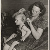 Ola, Idaho. FSA (Farm Security Administration) Ola self-help cooperative. Wife of a member and his son