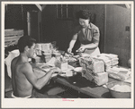 Rupert, Idaho. Former CCC (Civilian Conservation Corps) camp now under FSA (Farm Security Administration) management. Preparing lunches for the Japanese-American farm workers who live at the camp